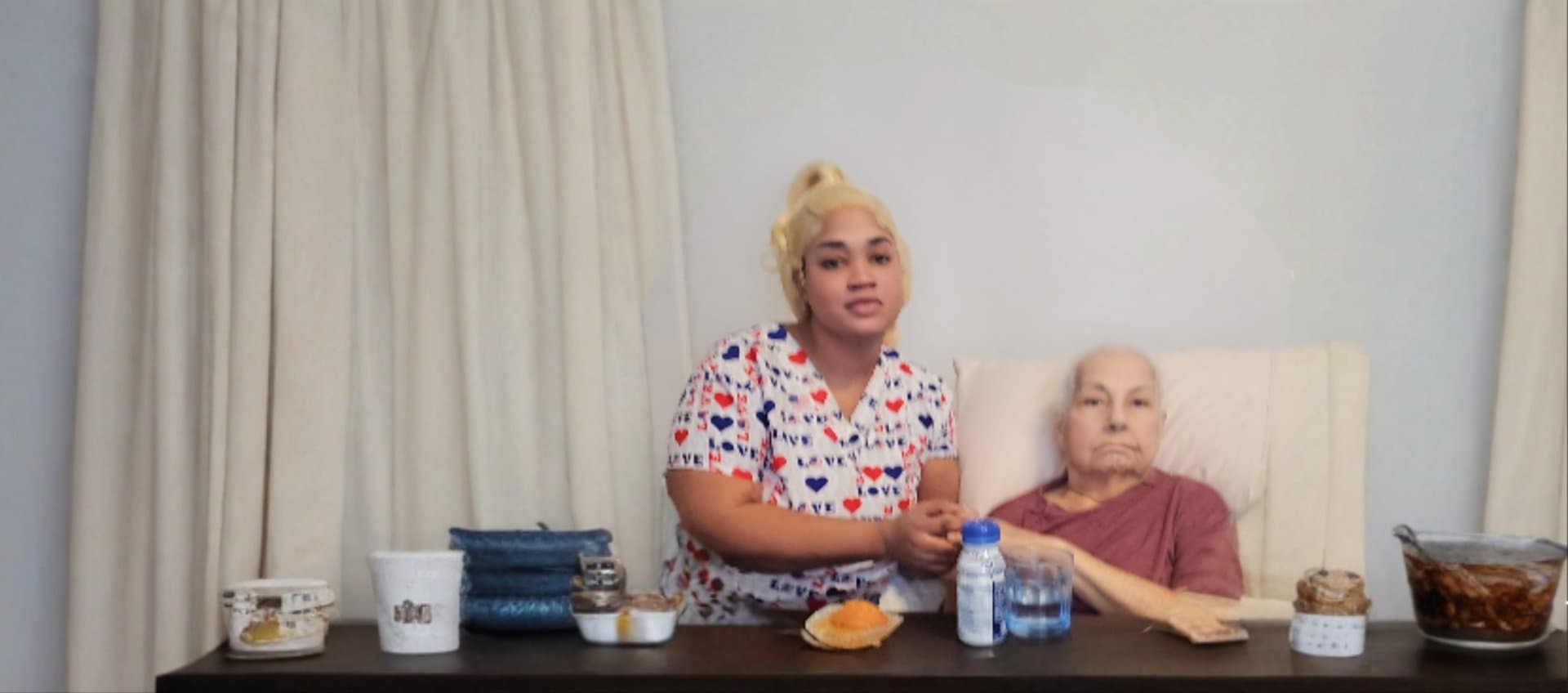 a caregiver and an eldelry man