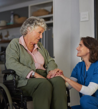 caregiver and senior on public park