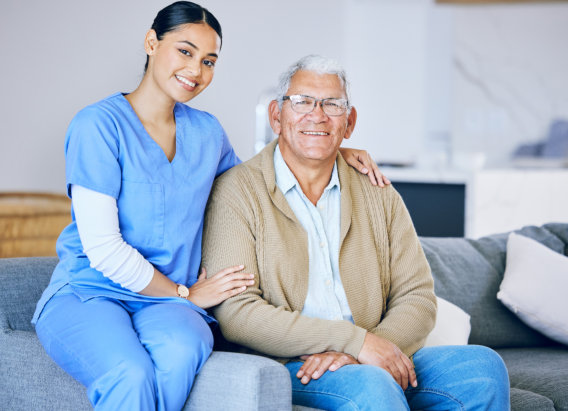 caregiver and senior smiling