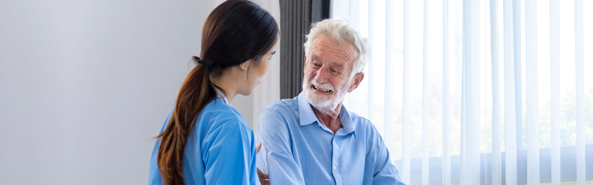 caregiver assisting senior